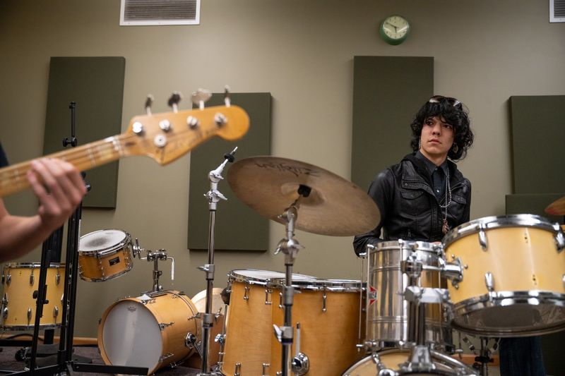 Student behind the drums