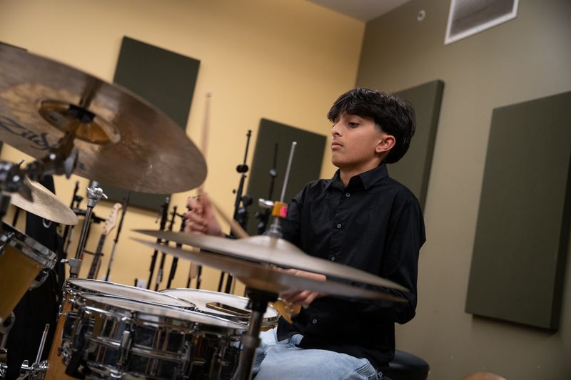 Young drummer in the studio